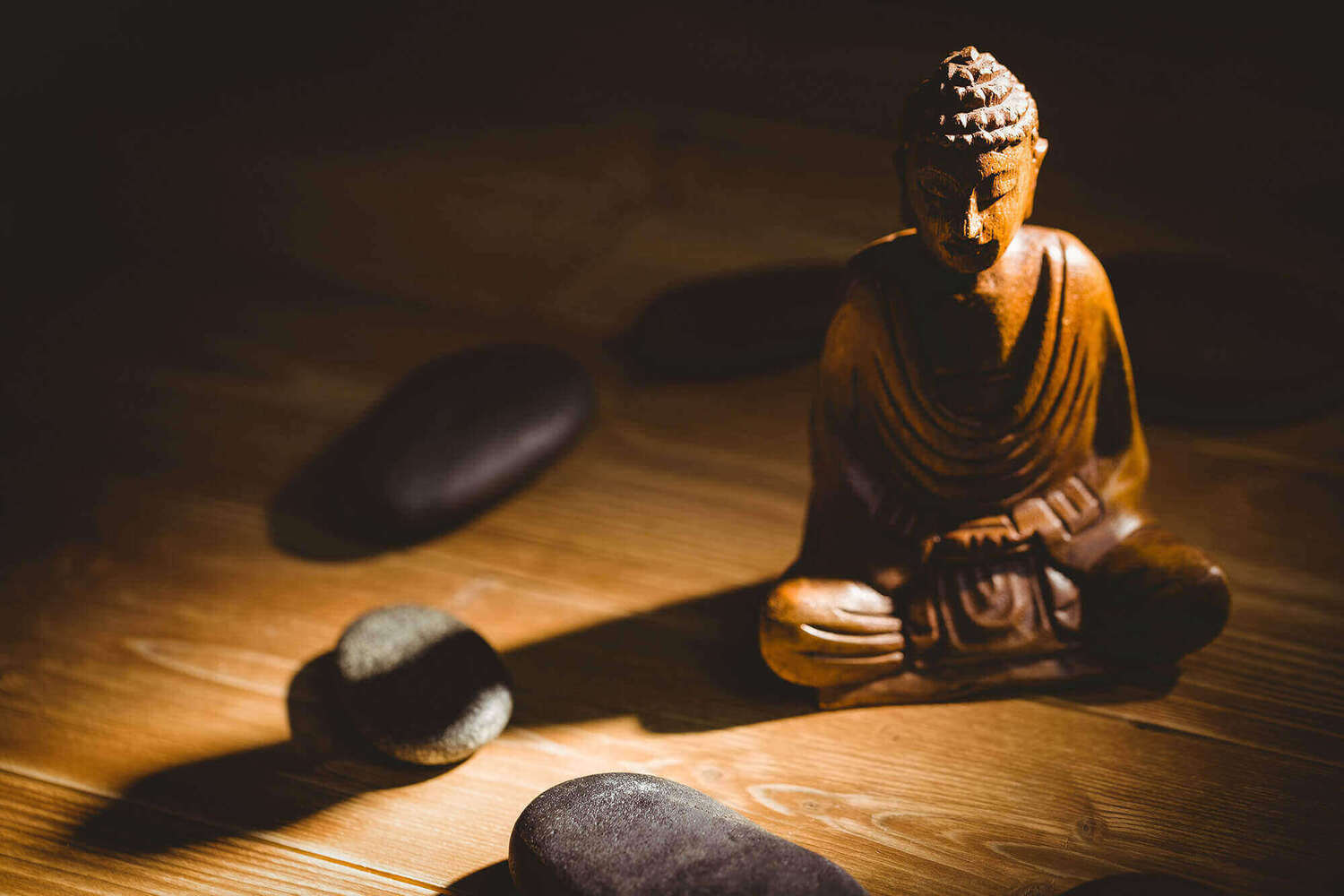 buddha figure in stone circle